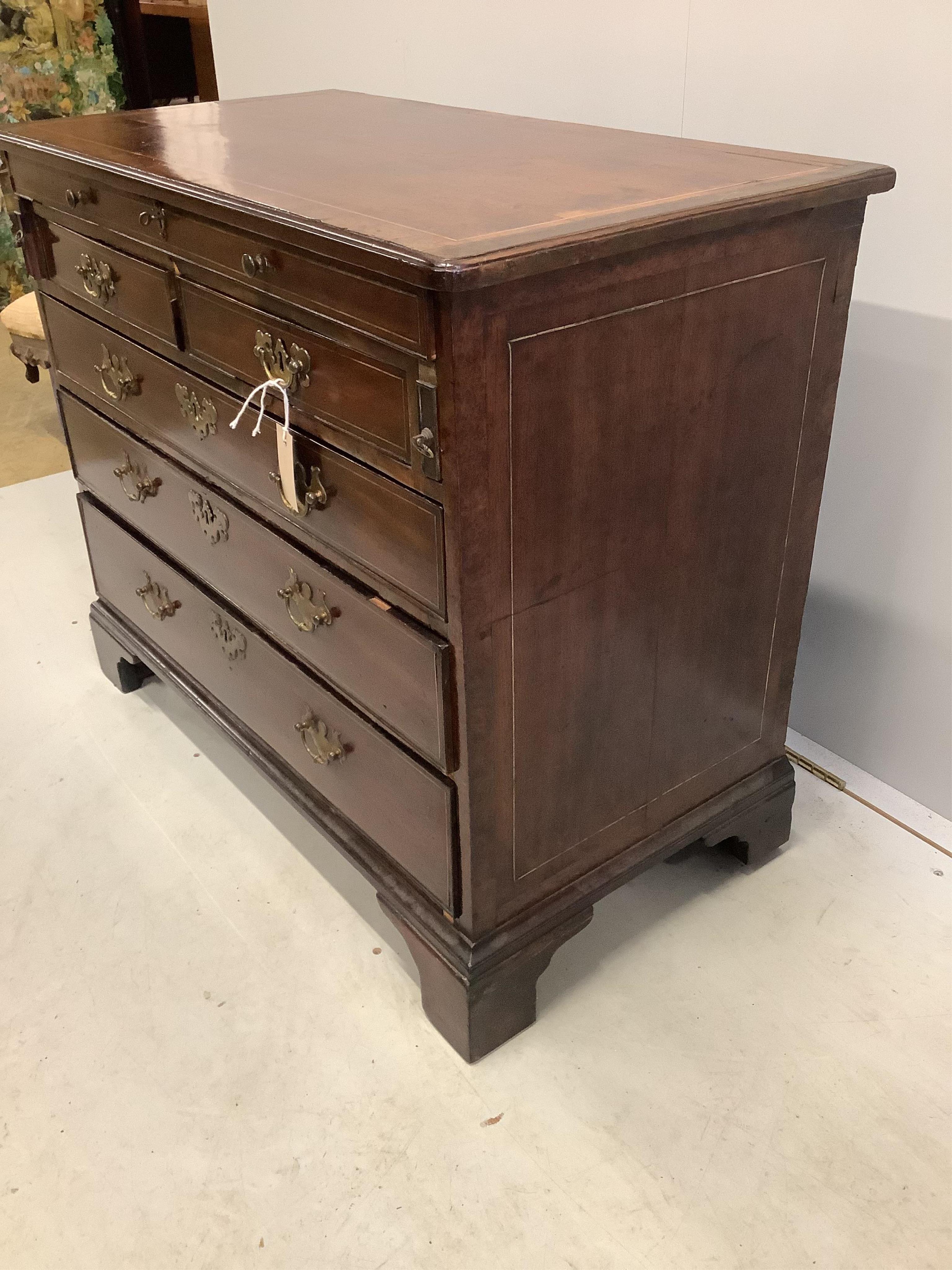 A George III, possibly padouk, brass inlay,dressing chest in the manner of John Channon, width 88cm, depth 47cm, height 74cm. Condition - fair